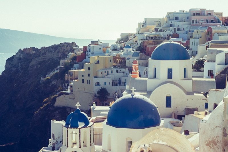 Blue dome rooftops in Oia, Santorini, Greece by Miss Gen Photography