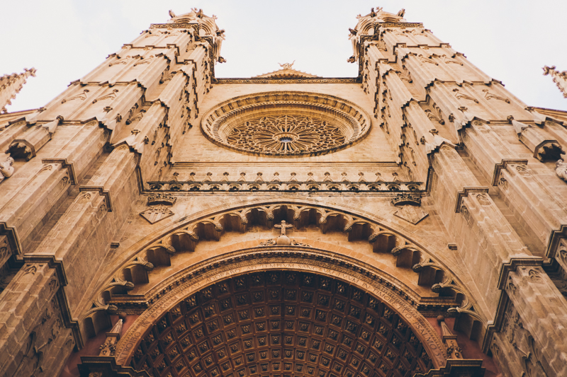 Cathedral in Palma in Mallorca, streets of the old town. Destination travel photography by destination wedding photographer Miss Gen Photography.