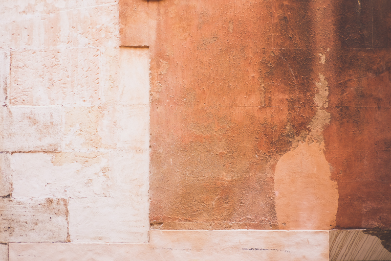 Textured wall in Soller in Mallorca, streets of the old town. Destination travel photography by destination wedding photographer Miss Gen Photography.