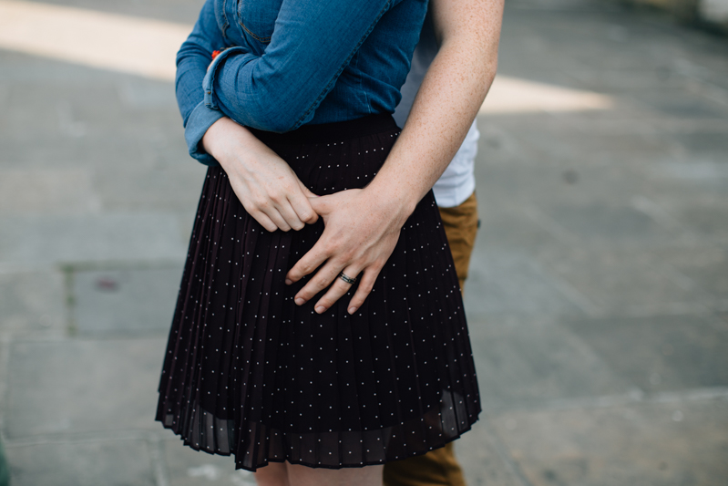 Man and woman's hands touching. Couple portrait photography session in Dalston, London by Miss Gen Photography - London and destination wedding photographer.
