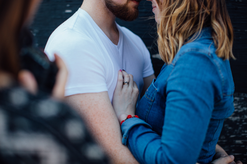 Her hand on his chest. Couple portrait photography session in Dalston, London by Miss Gen Photography - London and destination wedding photographer.