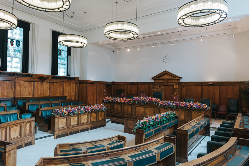 colourful wedding flowers in council chamber at town hall hotel by miss gen