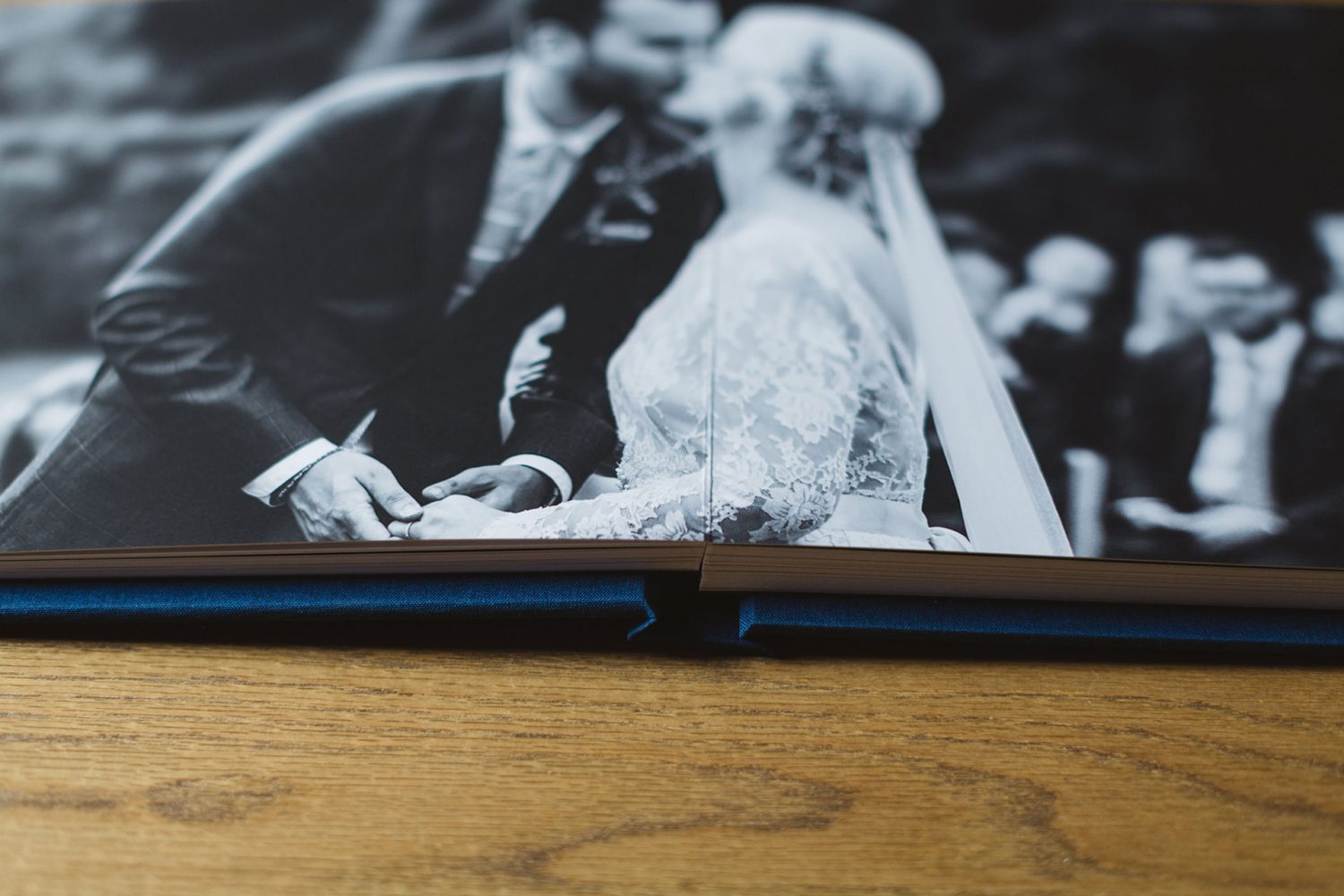 Modern wedding photo book with fabric cover and fine art paper