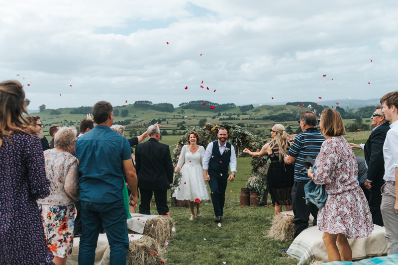 confetti at outdoor countryside wedding in new zealand by modern wedding photographer miss gen